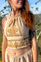 Woman wearing natural fabric crop top with camel blockprint geometric design from Ancient Butterfly Outfit Skirt Top Camel Blockprint collection outdoors