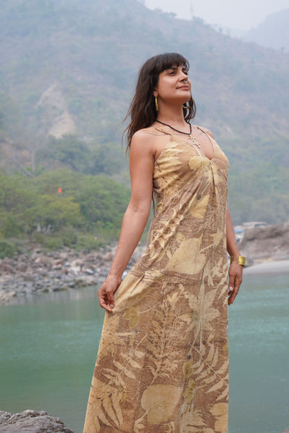 natural fiber botanical dye long dress with a V-neckline and thin straps, showcasing real seasonal leaf prints.