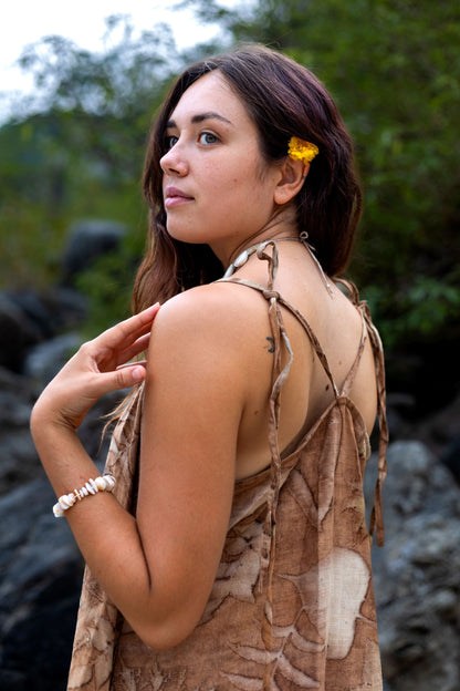 Back detail of tie strap boho slip dress. Natural dye botanical print open back dress.