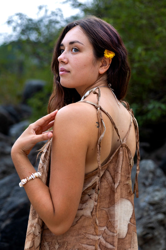 Back detail of tie strap boho slip dress. Natural dye botanical print open back dress.
