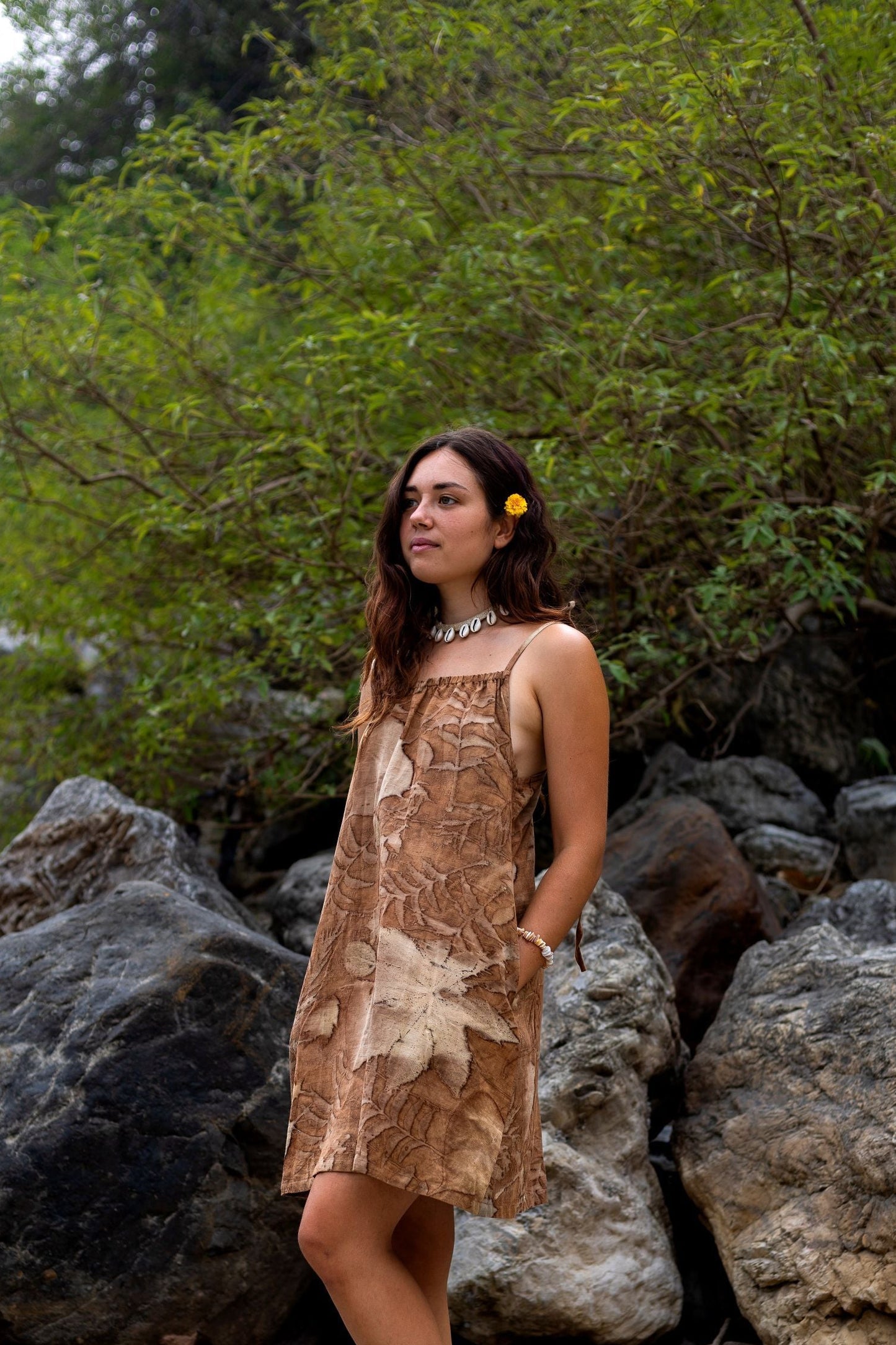 side view of loose natural plant dye short dress with pockets. Brown eco print summer dress.