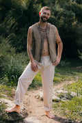 Himalayan nettle vest with frayed edges, natural layering piece worn outdoors.