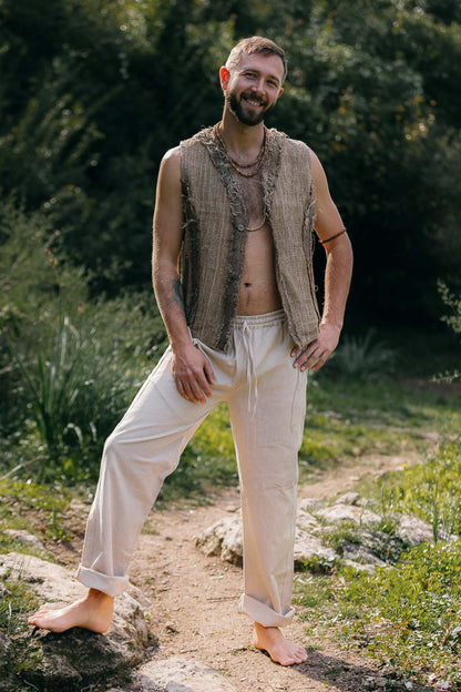 Himalayan nettle vest with frayed edges, natural layering piece worn outdoors.