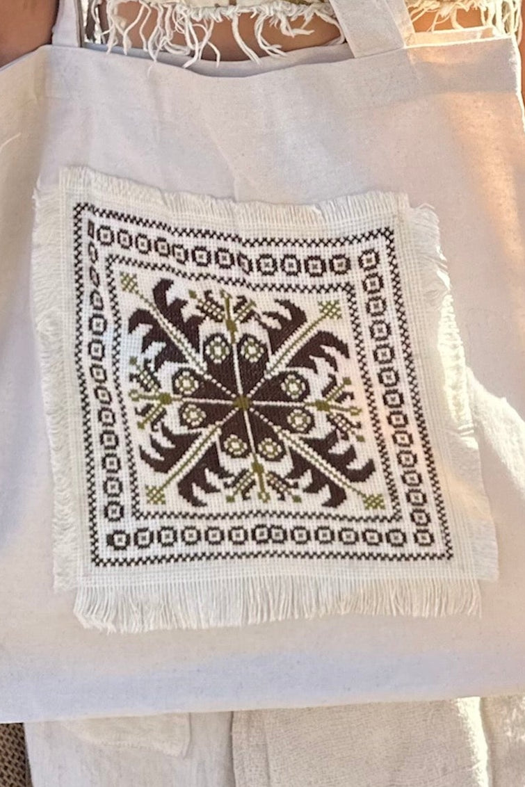 White tote bag with a bag with Palestinian hand embroidery 