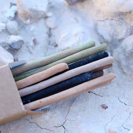 A variety pack of 10 handcrafted natural incense sticks, showing different textures of Palo Santo, Sandalwood, and Frankincense.