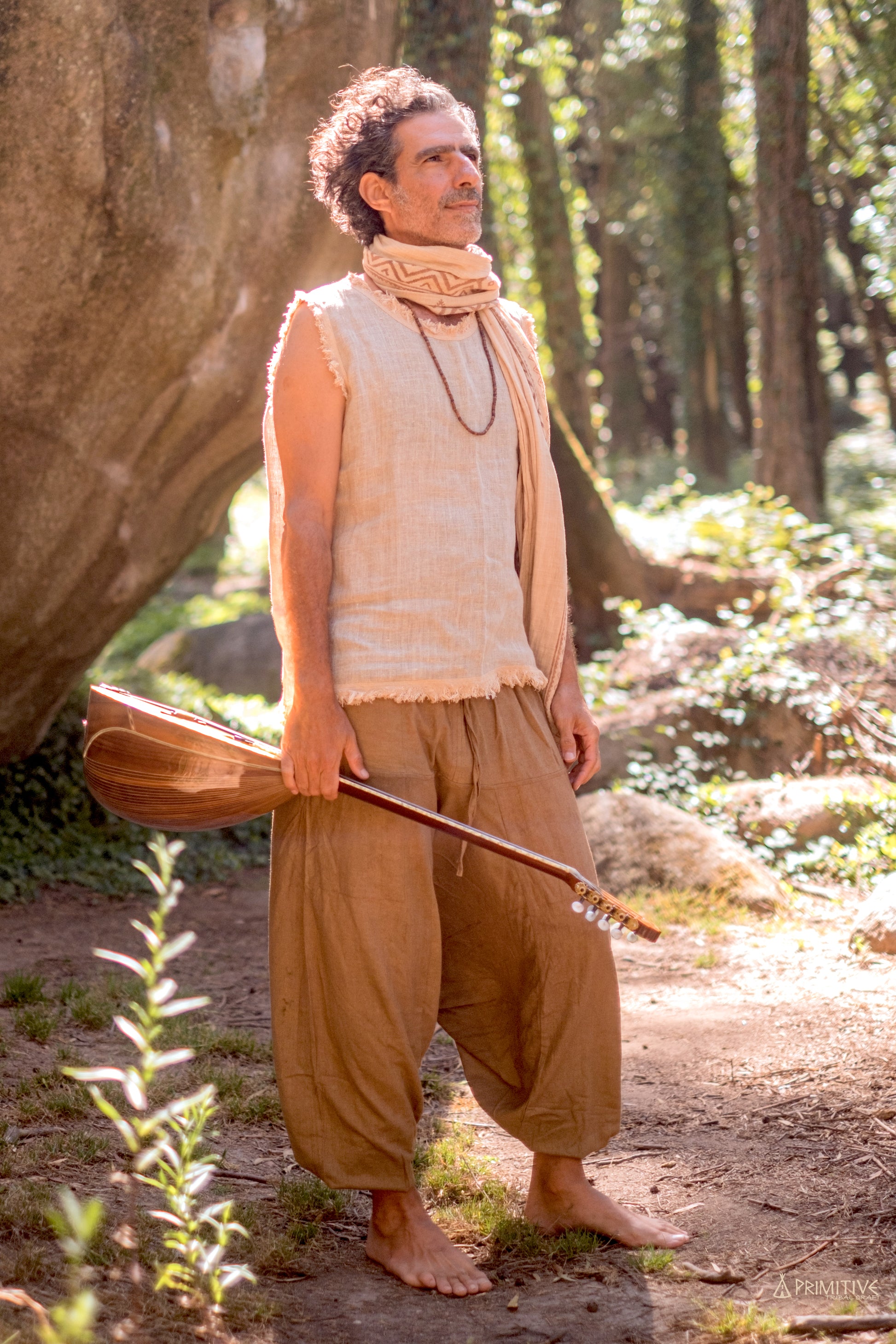 Handwoven raw silk harem pants in earthy brown styled in nature, breathable loose fit for easy movement, comfort and bohemian look.