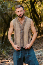 Man wearing handwoven Himalayan nettle yarn vest made from wild nettle fiber.