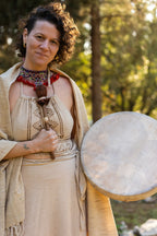 Natural boho outfit set with wrap skirt, halter top and shawl photographed in warm sunlight,יhippie festival and ceremony vibe
