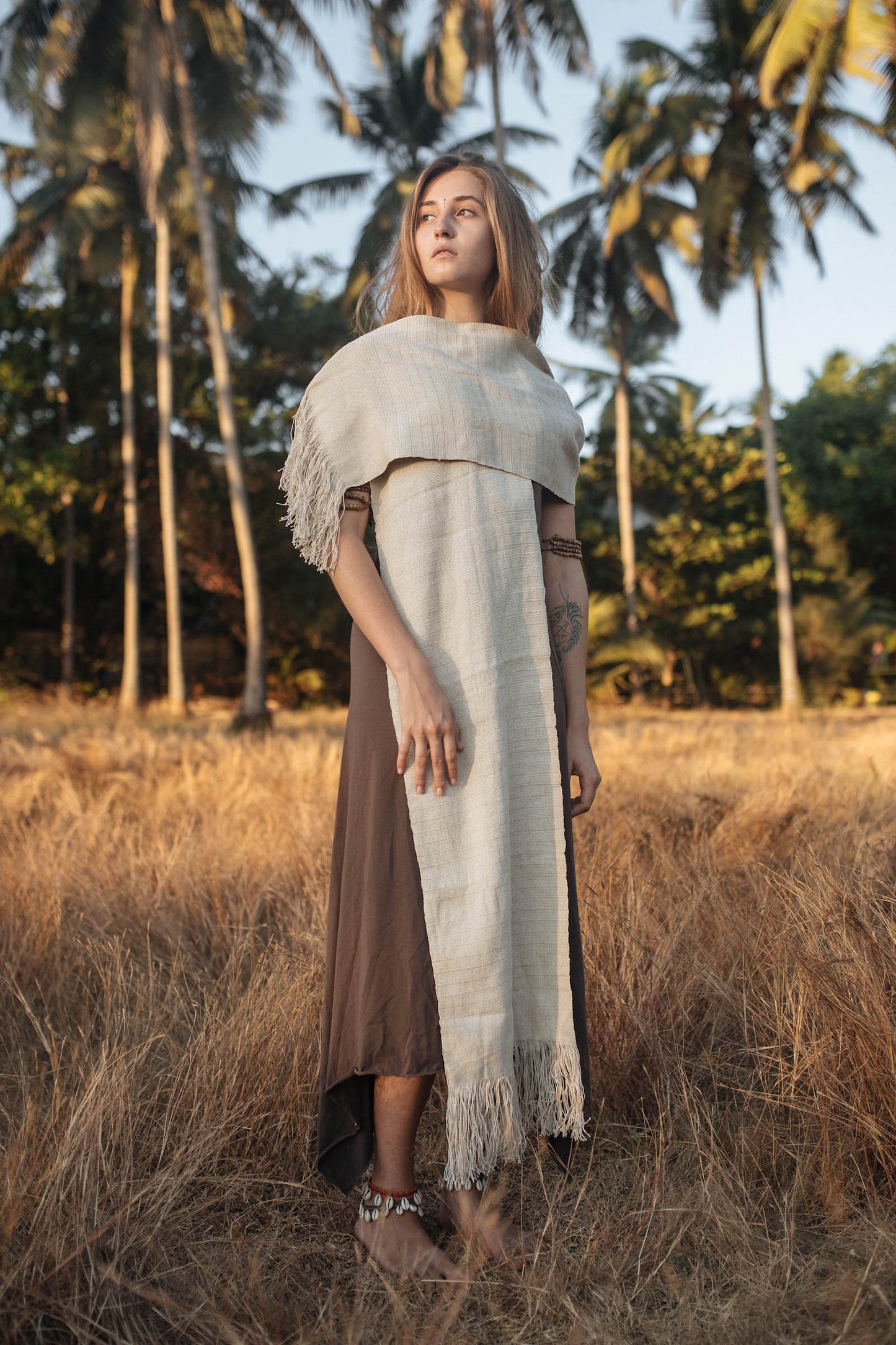 women wearing Handwoven Soft Hemp Shawl in natural color